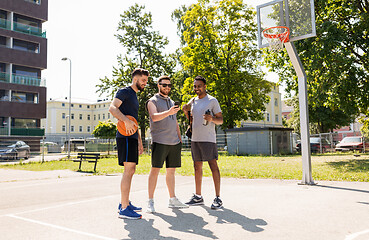 Image showing men with smartphone at basketball playground