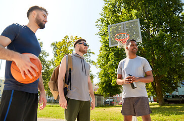 Image showing group of male friends going to play basketball