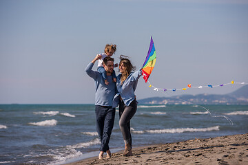 Image showing happy family enjoying vecation during autumn day