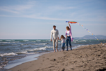 Image showing happy family enjoying vecation during autumn day