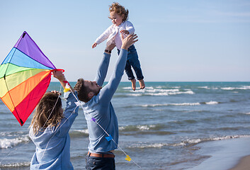 Image showing happy family enjoying vecation during autumn day