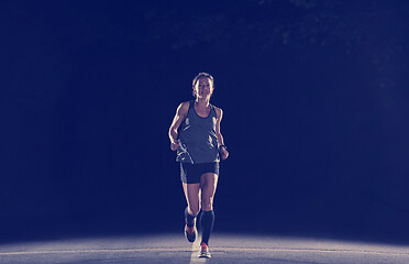 Image showing female runner training for marathon