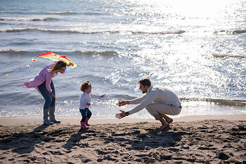 Image showing happy family enjoying vecation during autumn day