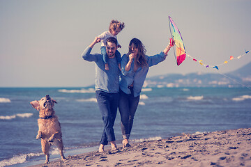 Image showing happy young family enjoying vecation during autumn day