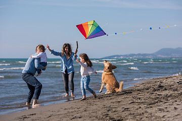 Image showing happy young family enjoying vecation during autumn day