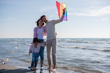 Image showing happy family enjoying vecation during autumn day