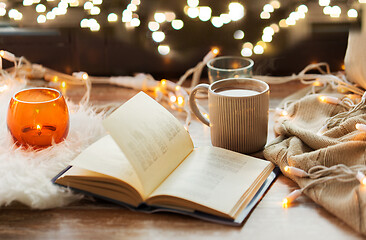 Image showing book and coffee or hot chocolate on window sill