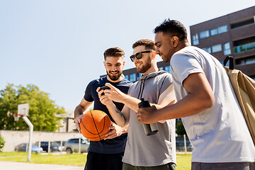 Image showing men with smartphone at basketball playground