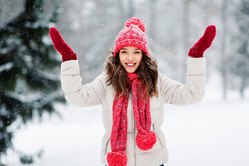 Image showing happy young woman in winter park