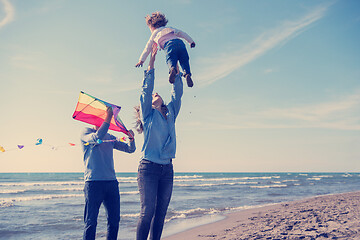 Image showing happy family enjoying vecation during autumn day