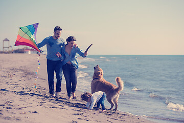 Image showing happy young family enjoying vecation during autumn day