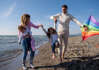 Image showing happy family enjoying vecation during autumn day