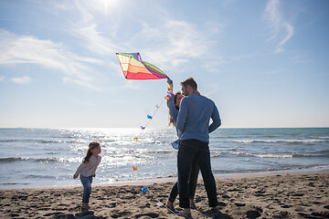 Image showing happy family enjoying vecation during autumn day