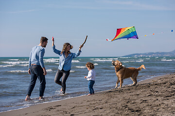 Image showing happy young family enjoying vecation during autumn day