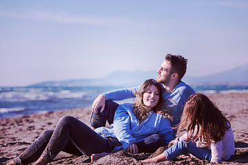 Image showing Young family enjoying vecation during autumn