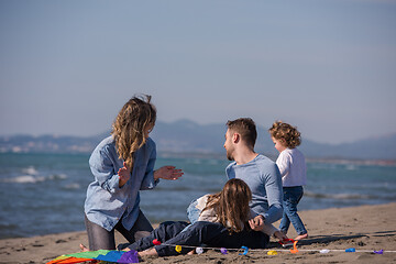 Image showing happy family enjoying vecation during autumn day