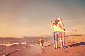 Image showing happy couple enjoying time together at beach