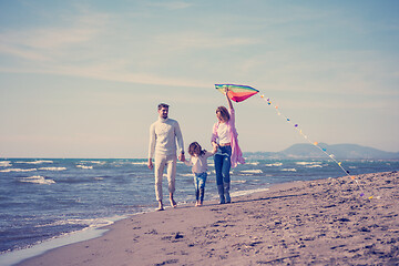 Image showing happy family enjoying vecation during autumn day