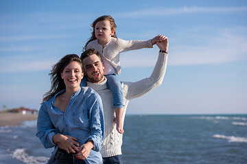 Image showing Young family enjoying vecation during autumn