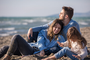 Image showing Young family enjoying vecation during autumn