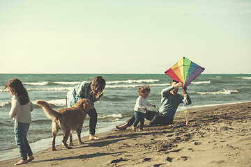 Image showing happy young family enjoying vecation during autumn day