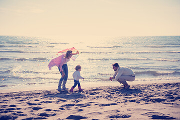 Image showing happy family enjoying vecation during autumn day