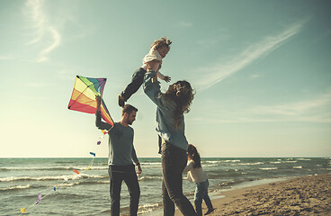 Image showing happy family enjoying vecation during autumn day