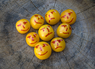 Image showing yellow plums like emoticons