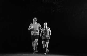 Image showing runners team on the night training