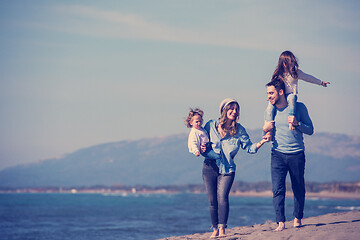 Image showing Young family enjoying vecation during autumn