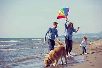 Image showing happy young family enjoying vecation during autumn day