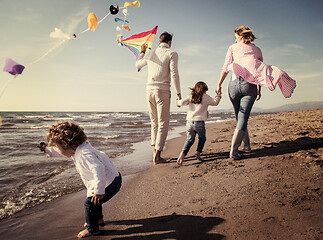 Image showing happy family enjoying vecation during autumn day