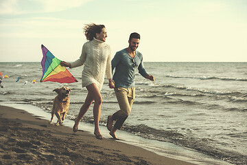 Image showing happy couple enjoying time together at beach