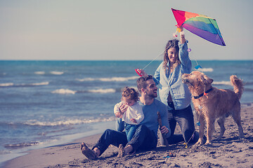 Image showing happy young family enjoying vecation during autumn day