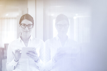 Image showing Business Woman Using Digital Tablet in front of startup Office