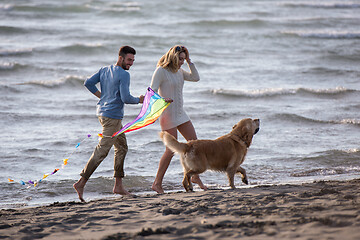 Image showing happy couple enjoying time together at beach