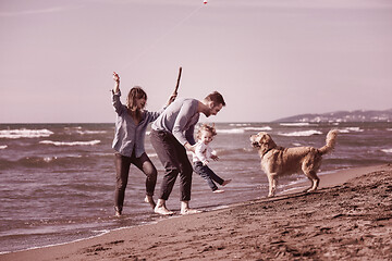 Image showing happy young family enjoying vecation during autumn day