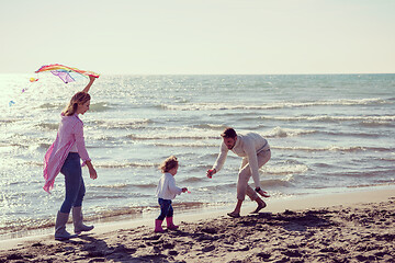 Image showing happy family enjoying vecation during autumn day