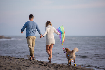 Image showing happy couple enjoying time together at beach