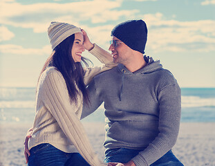 Image showing Couple chating and having fun at beach bar