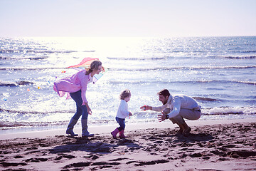 Image showing happy family enjoying vecation during autumn day