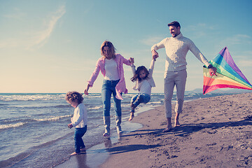 Image showing happy family enjoying vecation during autumn day