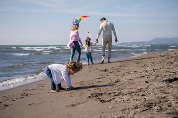 Image showing happy family enjoying vecation during autumn day