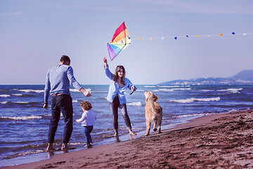 Image showing happy young family enjoying vecation during autumn day