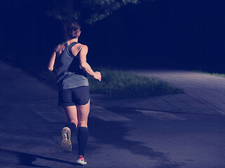 Image showing female runner training for marathon