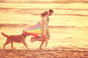 Image showing happy couple enjoying time together at beach