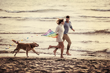 Image showing happy couple enjoying time together at beach