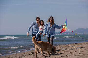 Image showing happy young family enjoying vecation during autumn day