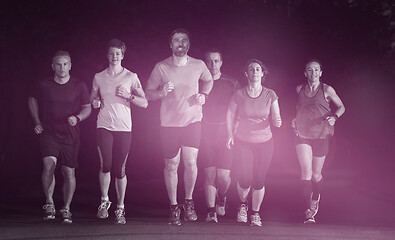 Image showing runners team on the night training