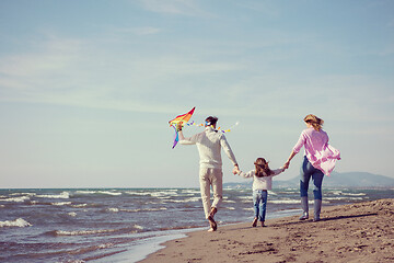 Image showing happy family enjoying vecation during autumn day